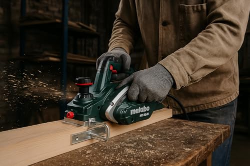 Foto von Metabo Hobel HO 26-82 (Hobelbreite 82 mm, Hobeltiefe einstellbar 0-2,6 mm, Softgrip-Oberfläche, 620 W, mit Staubbeutel + Hobelmesser, weiteres Zubehör) 602682000