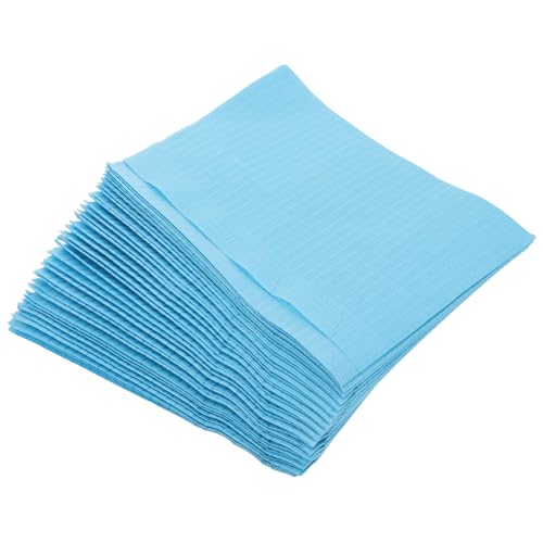 Tapis bleu manucure jetable pour un bureau de nail art propre à la maison ou en salon