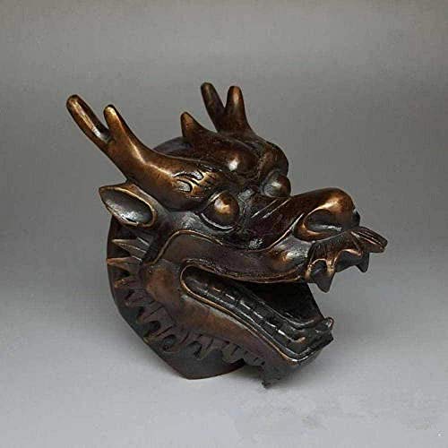 Statues d'art chinoises en bronze sur une bibliothèque de salon moderne