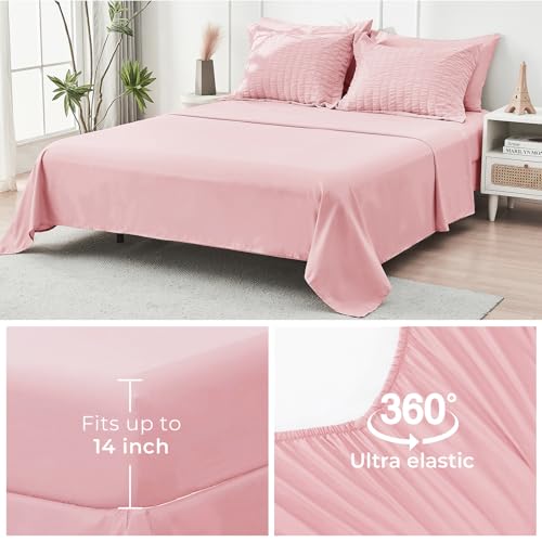 Image of HYMOKEGE Pink Oversized King Comforter Set Seersucker 7 Pieces, All Season Luxury Bed in a Bag for Bedroom, Bedding Set with Comforter, Sheets, Pillowcases & Shams