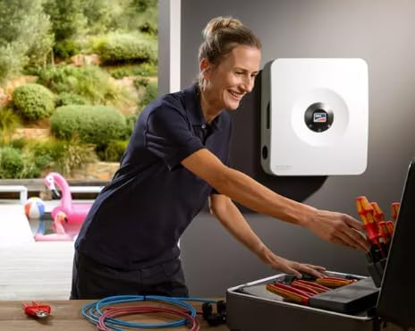 Installer working with the Sunny Boy Smart Energy inverter