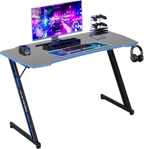 Image of 47 Inch Modern Gaming Desk for Home Office, Z Shaped Computer Desk for Teen, Large PC Gaming Table Adjustable Feet with Headphone Hook & PVC Surface