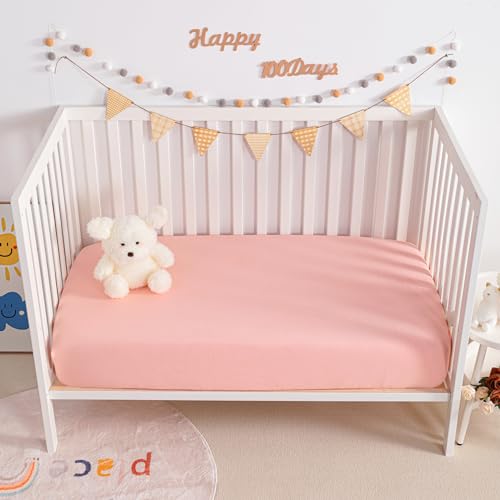Image of NTBAY 2 Pack Muslin Cotton Mini Crib Sheets, Soft and Breathable Double Layer 24x38 Baby Crib Sheets for Mini Crib and Toddler Mattresses, Boys, Girls, Unisex, Coral Pink, 24x38 Inches