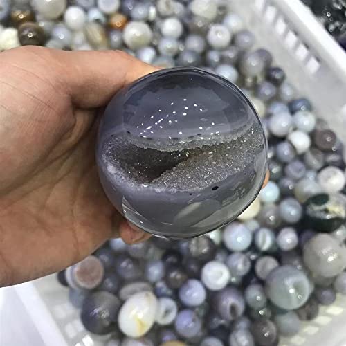 Pierre de cristal en boule d'agate transparente d'exception avec géode naturelle