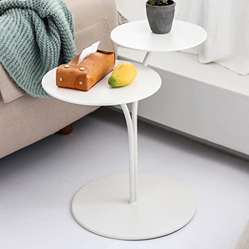 Table basse ronde blanche compacte pour optimiser les petits salons