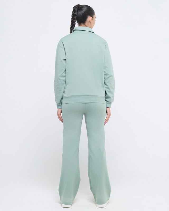 Image of HUNNIT Essential Flare Pants for Women with Zip Pockets | Mid Waist Solid Cotton Tapered Flare Pants | Bootcut Flared Trousers with Wide Elastic Waistband | Relaxed Fit Flared Trouser