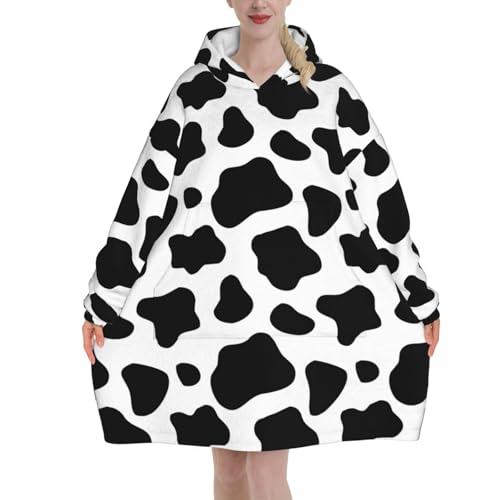 Sweat plaid vache en flanelle pour vos soirées cocooning canapé