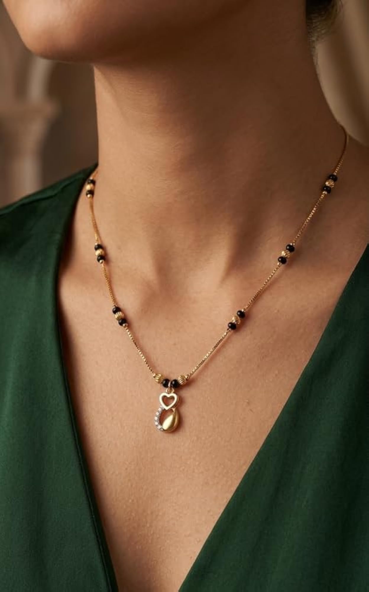 Women's Elegant Gold Heart Mangalsutra with Black Beads