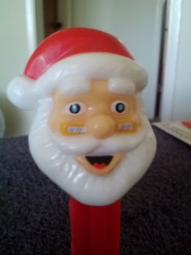 Dispensador Santa Pez vintage con pies y gafas abiertas para coleccionistas