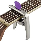 La cejilla para guitarra está hecha con metal de aleación de zinc, y la almohadilla de material de silicona proporciona protección entre trastes y cuerdas.