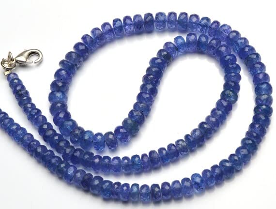 Perles tanzanite naturelle facettée 4-6.5mm en fil de 43cm pour création