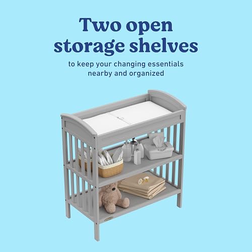 Image of Graco Benton Changing Table with Bonus Water-Resistant Changing Pad (Pebble Gray) - GREENGUARD Gold Certified, Includes Diaper Change Pad with Safety Strap, 2 Open Storage Shelves for Organizing