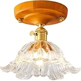 Abat-jour floral en verre: Orné d'un captivant abat-jour en verre transparent, aux formes délicates, aux bords délicats en forme pétales floraux et aux détails texturés, ce modèle projette magnifiques jeux lumière, ajoutant une touche charme artistique et grâce vintage à votre espace.