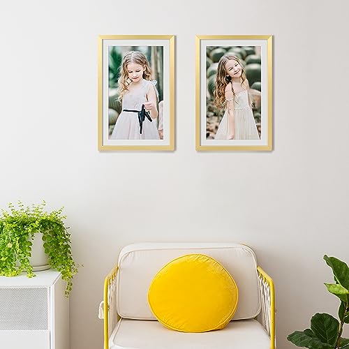 Image of upsimples 11x17 Picture Frame, Display Pictures 9x15 with Mat or 11 x 17 Without, Wall Hanging Poster Frames, Gold, 1 Pack