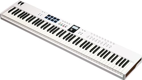 Image of Arturia KeyLab Essential 88 mk3 with 88 Velocity-Sensitive keys, 9 Encoders, 9 Sliders, 8 RGB Pads - USB-C, Midi Out, LCD Screen, Bundled Software and DAW Integration - White