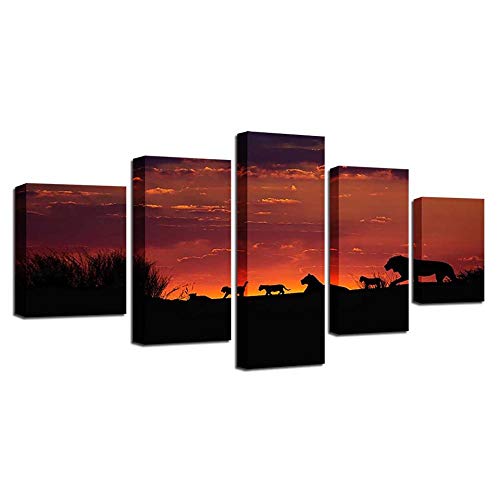 Lions in the sunset impression sur toile pour une ambiance chaleureuse