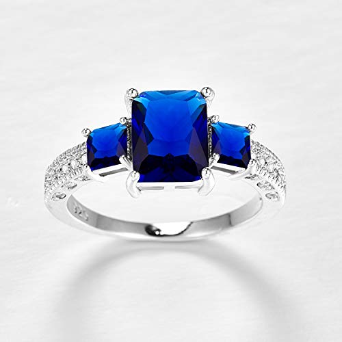 925 Sterling Silver Plated Emerald Cut Simulated Blue Sapphire Quatrz 3 Stone Promise Engagement Ring for Women3
