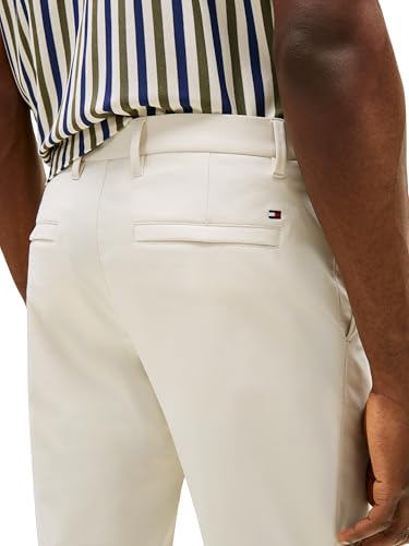Image of Tommy Hilfiger Men's Casual Moisture Wicking Wrinkle Resistant Stretch Performance Pants in Straight Fit
