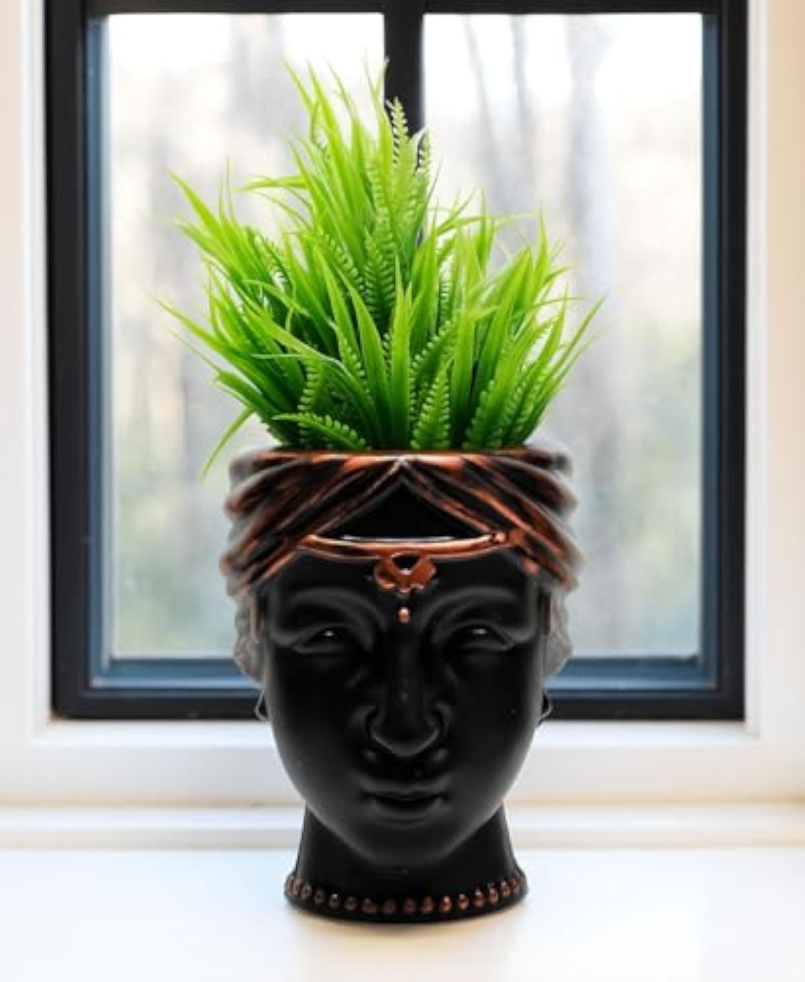 Artificial Plant with Black Queen Faces Pot for Home Decoration