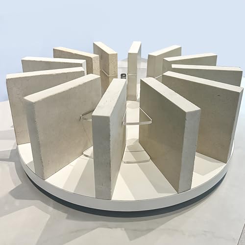 Étagère rotative d'échantillons pour carrelage et parquet en magasin de déco