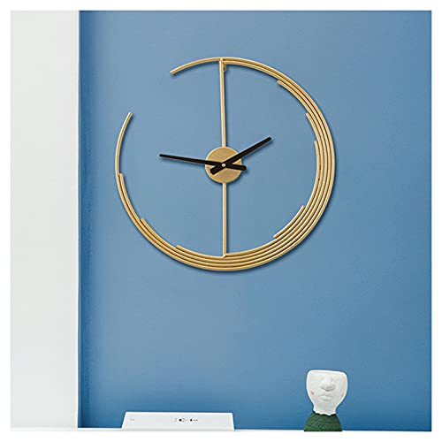 Horloge murale moderne en forme de lune dorée pour salon chic