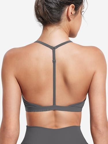 Image of YEOREO CoreFlex Sports Bras for Women Strappy Padded Halter Open Back Light Impact Deep V Neck Yoga Workout Gym Tops