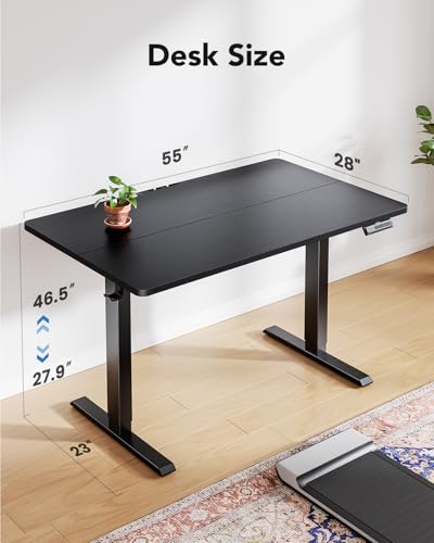 HUANUO 55" x 28" Electric Standing Desk Adjustable Height, 4 Memory Height Settings, Headphone Hook, Cable Manager, Sit Stand Up Desk for Home Office & Computer Workstation, Black