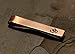 Copper tie bar with Om sign