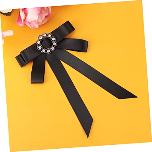 Broche bowknot en strass idéale sur une cape pour les soirées