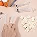 Kifmurase 100 PCS Large Disposable Nitrile Finger Cots, Non-allergenic No Powder Finger Protectors Covers for Beauty, Manicure, Massage, Electronic Repair (White)