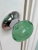 Absolutely stunning design of Round Green / Mint Bubble glass door knobs 1 Pair of sprung loaded handles plus spindle bar and screws Will give an amazing look and a touch of class to any door within your home Base plate made of solid Brass with a Chr...