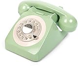 Traditionelles Wähltelefon und lockiges Kabel