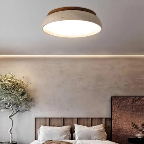 Plafonnier LED dimmable Wabi Sabi en travertin pour une ambiance de chambre zen