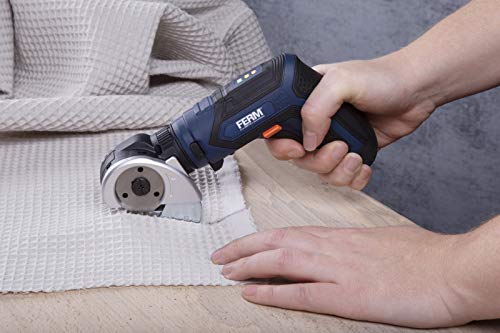 User operating the Ferm CDM1150 screwdriver in a confined space, illuminated by the LED worklight.