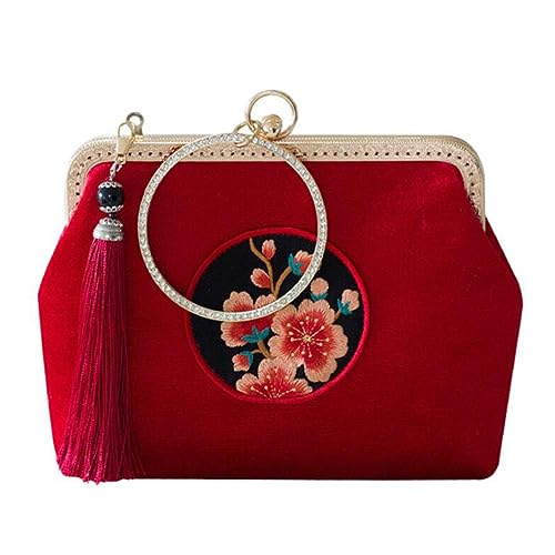 Sac à main avec pompon pour mariage et cadre de fête floral