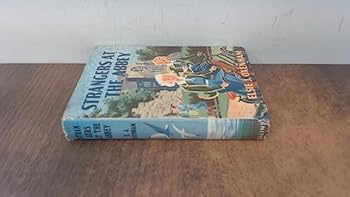 Hardcover Strangers At the Abbey Book