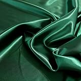 Dieser dunkel grüne Satin-Stoff, auch Faschingsseide genannt, ist seidig glänzend, hat einen weichen Griff, fällt fließend und ist blickdicht. Die Rückseite ist matt. Er ist strapazierfähig, farbecht, pflegeleicht und bereits vorgewaschen. Läuft also nicht mehr ein . Waschbar bei 40° C, trocknergeeignet und bügelleicht