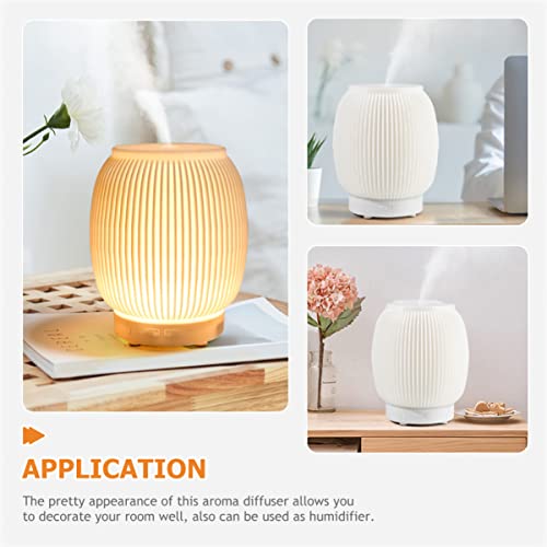 Diffuseur aromathérapie USB élégant avec lumière d'ambiance design