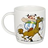 Mug en porcelaine de qualité de la marque allemande Könitz Astérix et Obélix. Idéal pour un cadeau, compatible avec micro-ondes et lave-vaisselle. Le petit-déjeuner sera beaucoup plus amusant si vous êtes un fan des légendaires BD d'Astérix et Obélix. Équitation. 350ml.