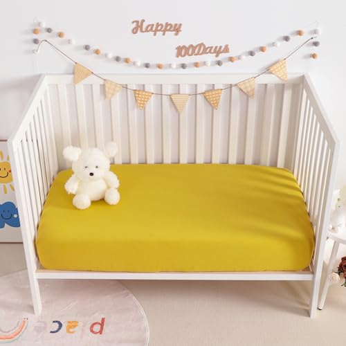 Image of NTBAY 2 Pack Muslin Cotton Mini Crib Sheets, Soft and Breathable Double Layer 24x38 Baby Crib Sheets for Mini Crib and Toddler Mattresses, Boys, Girls, Unisex, Ginger Yellow, 24x38 Inches