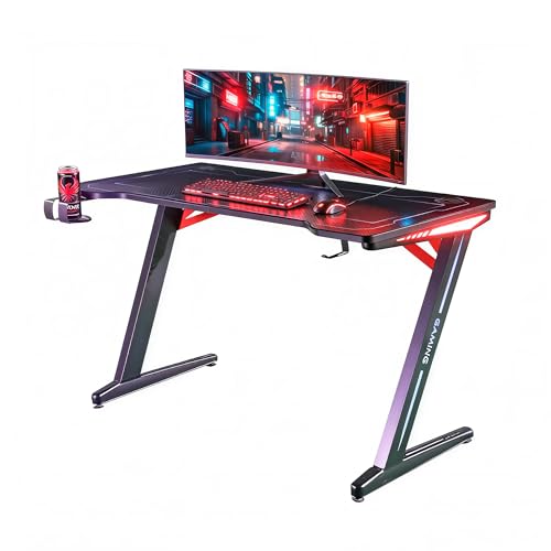 Unicview Escritorio Gaming 140 cm x 60 cm, Mesa para Ordenador Consola PS5, Xbox Series, pies de Acero, RGB LED, Base de alfombras, Rejilla para Recoger Cables 🔥