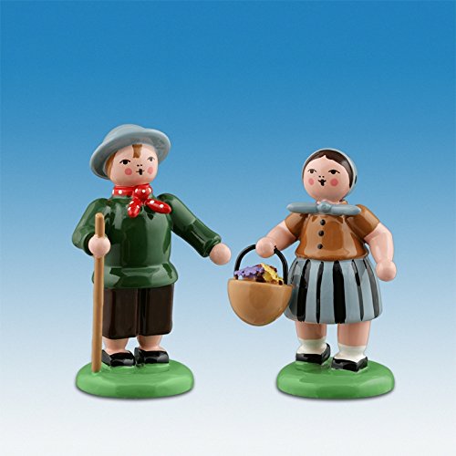 Figurine en bois sculpté de 7cm avec fleur de minerai et ressort oscillant