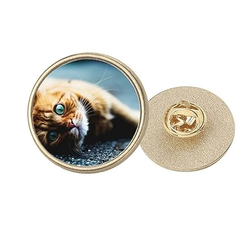 Broche chat aux yeux bleus en métal doré finitions soignées M