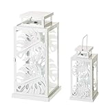 Set de dos faroles con hojas de color blanco fabricado en metal de hierro con puerta frontal de apertura , cristales laterales , asa superior con venta de ventilación .