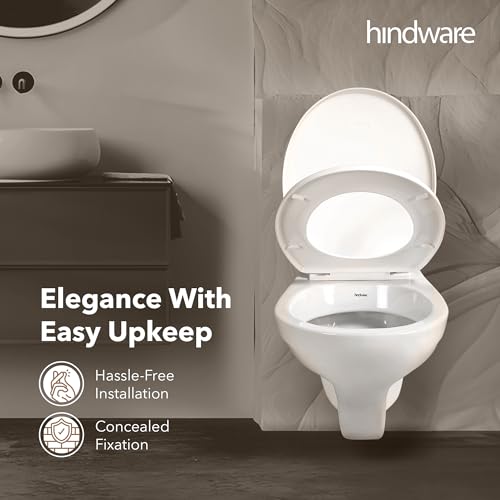 Image of Hindware Classik Wall Hung Western Commode for Bathroom | Made of Ceramic | P-230 Trap | Soft Close Feature | Star White | Oval Shape | Wall Mount Ewc | 10-Year Manufacturer Warranty