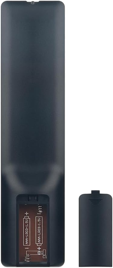 Back view of the NKF RM-C3348 remote control with the battery compartment open, showing two AAA batteries being inserted.