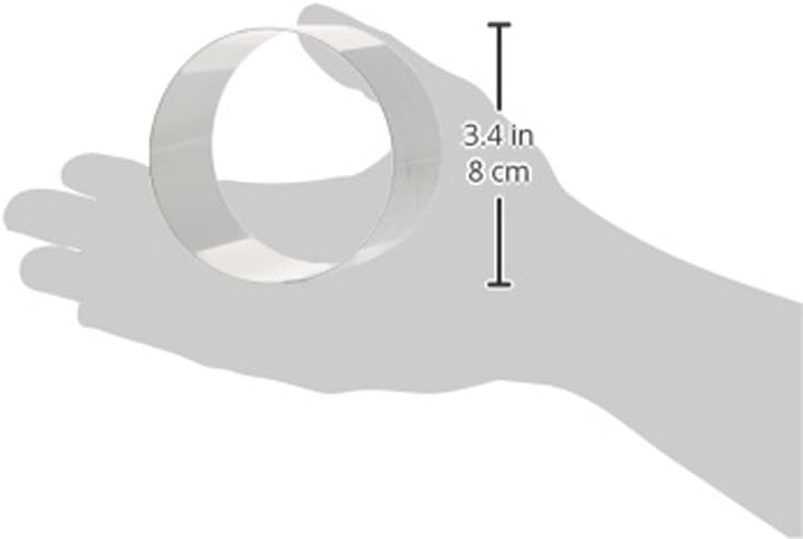 Hand holding baking ring showing 3.4 inch / 8 cm height