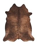 Einzigartige Drucke in Kuhhaut Texturen machen dieses Fell zu einem echten Blickfang im Wohnzimmer, Schlafzimmer, Küche oder auch als Geschenk für Kinder und Familie