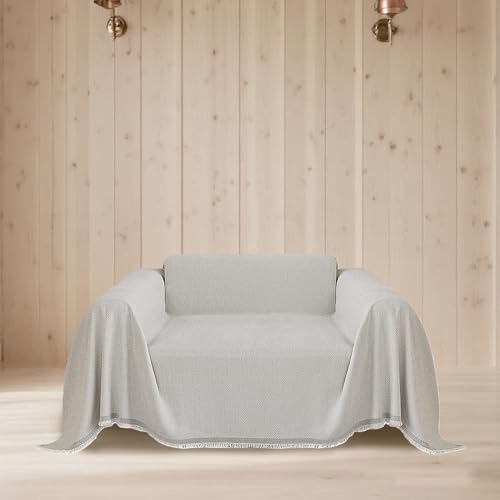 Jeté de canapé antidérapant avec pompons idéal pour des soirées cocooning