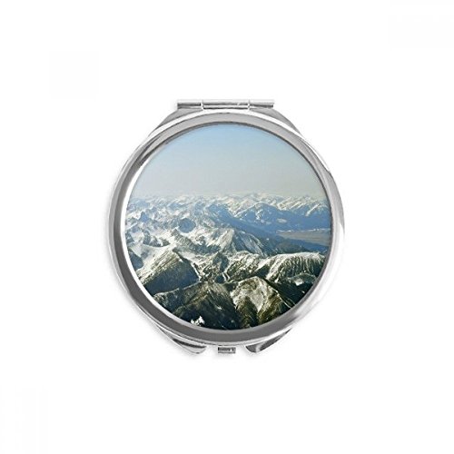 Miroir de poche compact contre les retouches manquées motif montagnes d'hiver